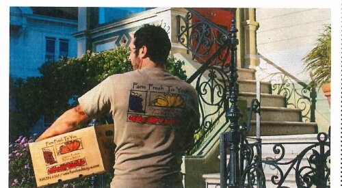 A Farm Fresh To You driver delivering a box to a front door